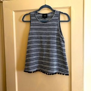 Lightly worn black and white top w black tassels